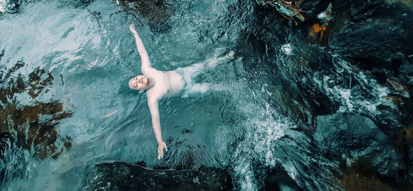 Full length of man swimming in sea