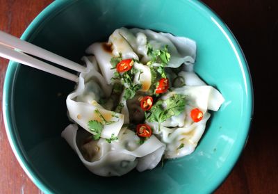 High angle view of chinese dumplings in bowl on table