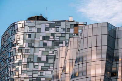 Low angle view of modern building against sky