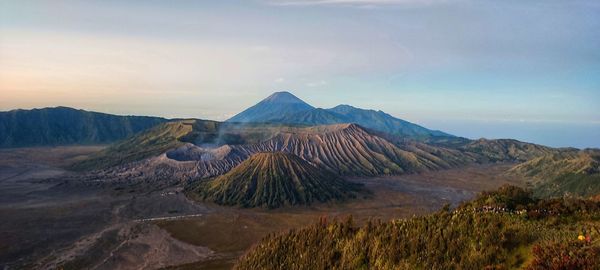 Scenic view of mountains against sky during sunset