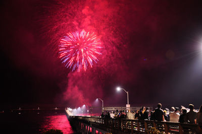 Firework display at night