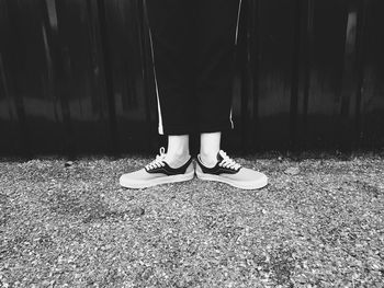 Low section of woman standing on floor