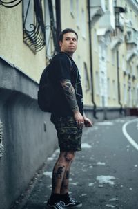 Full length of man walking on street