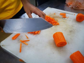 Midsection of man preparing food