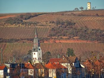 Buildings in city against sky