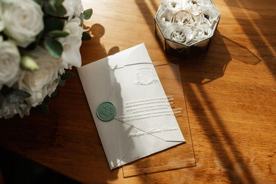 High angle view of wedding rings on table