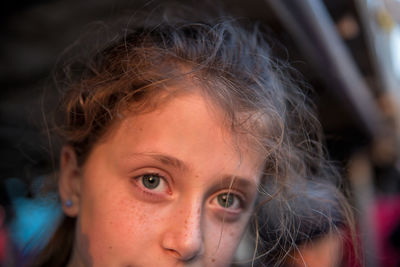 Close-up portrait of girl with gray eyes