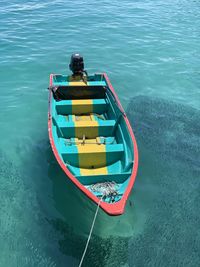 High angle view of boat floating on sea