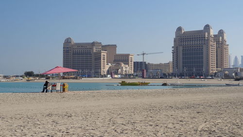 View of beach against blue sky