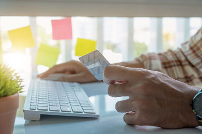 Man using laptop on table