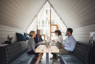 Business people discussing in meeting at table