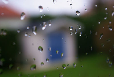 Full frame shot of water against window