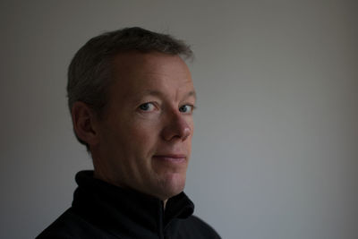 Portrait of man against white background