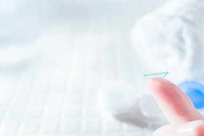 Close-up of person holding umbrella