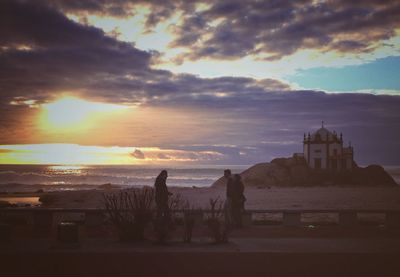 Scenic view of cloudy sky at sunset