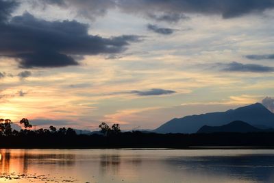 Scenic view of lake against sky during sunset