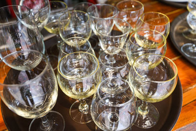 High angle view of wine glasses on table