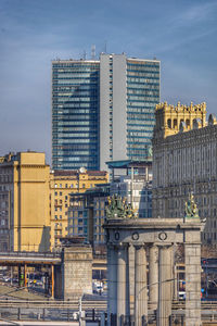 Buildings in city against sky