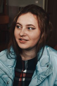Portrait of smiling young woman