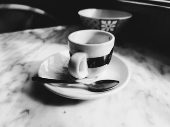 Close-up of coffee cup on table