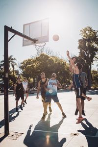 People playing basketball court
