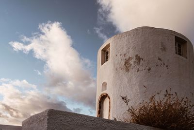 Low angle view of old building against sky