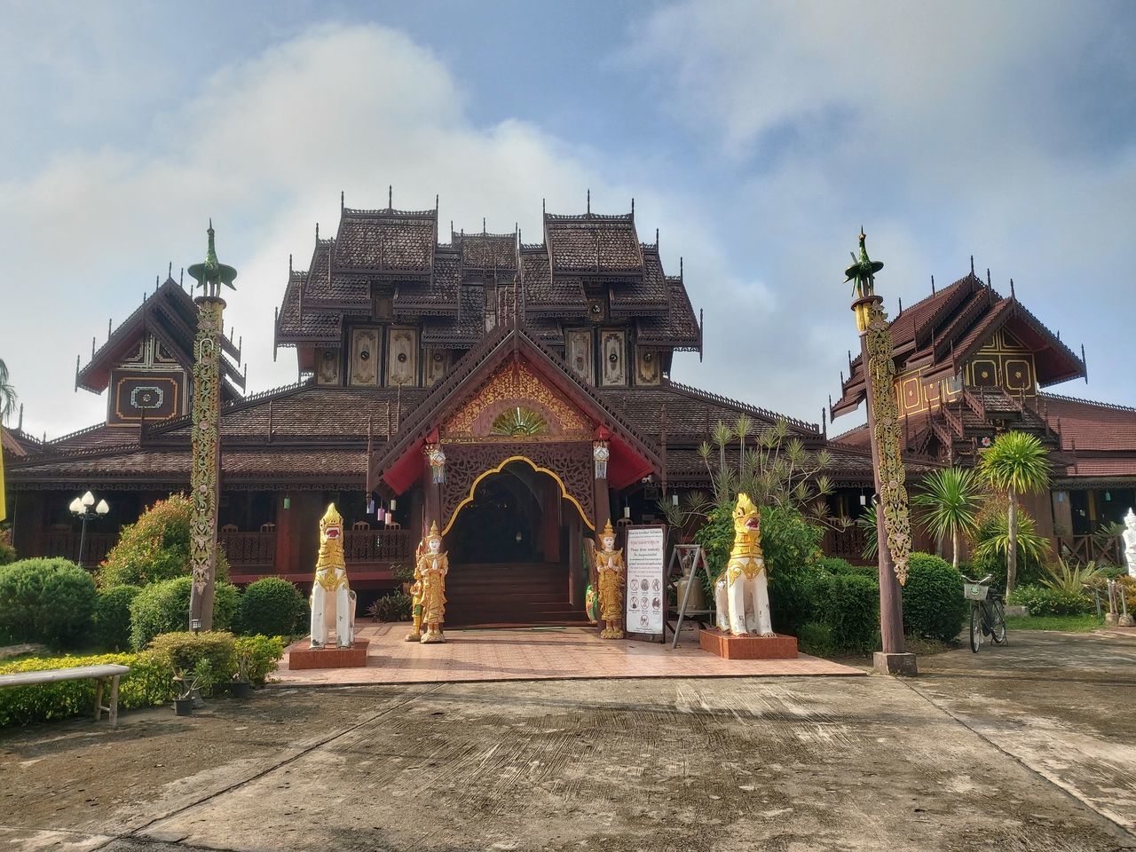 FACADE OF TEMPLE AGAINST BUILDING