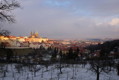 View of city during winter against sky