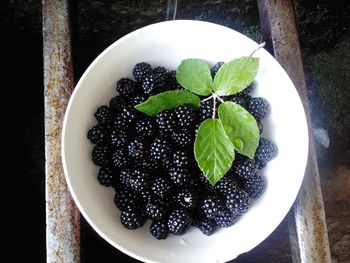 High angle view of blackberries in bowl