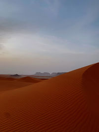 Scenic view of desert against sky