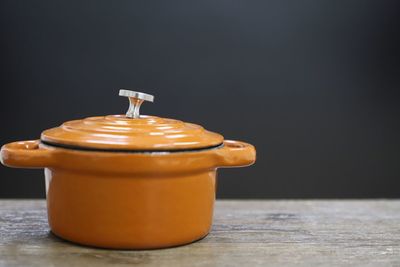 Close-up of coffee on table against black background