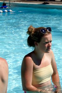 High angle view of teenage girl swimming in pool