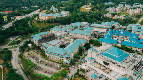 High angle view of townscape by road in city