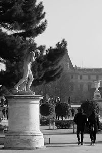 Silhouette of woman in city