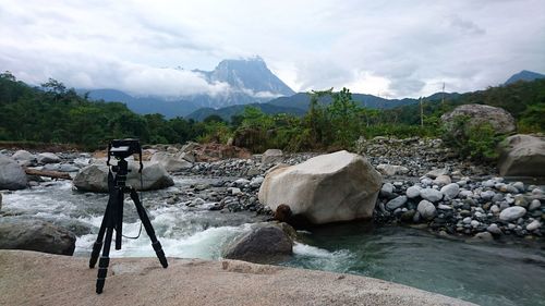 Camera with tripod on mountain kinabalu