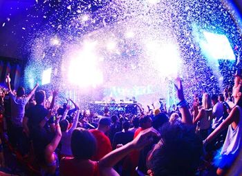 Group of people enjoying at concert