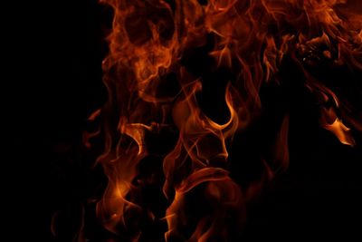 Close-up of fire against black background