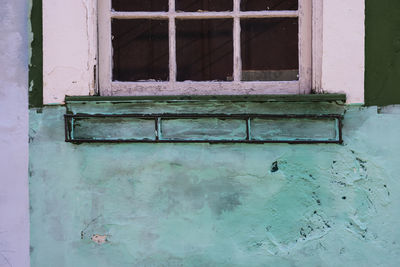 Abandoned window on old building