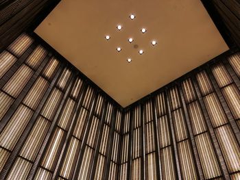 Low angle view of illuminated ceiling