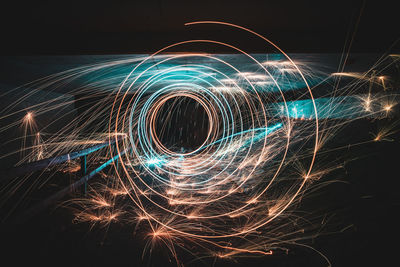 Light painting of firework display at night