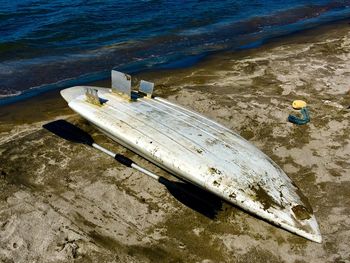 High angle view of abandoned boat on beach