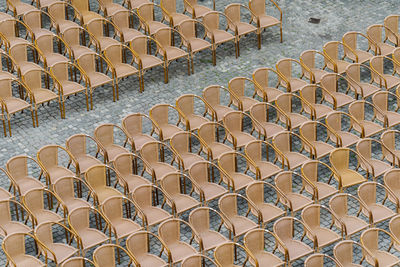 Full frame shot of peeled chairs in row