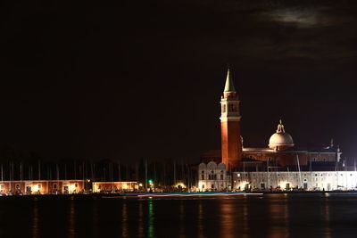 View of illuminated buildings at night