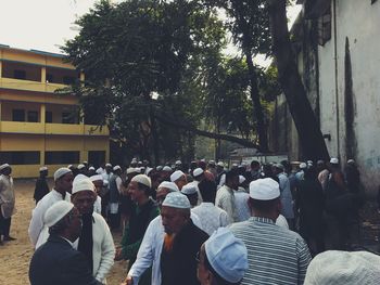 Group of people in front of trees