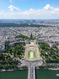 High angle view of city against cloudy sky