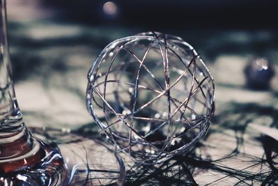 Close-up of wire ball on table