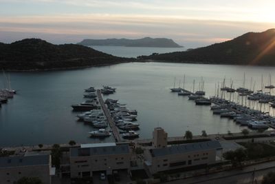 High angle view of harbor at sunset