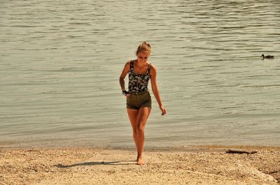 Full length of woman on beach