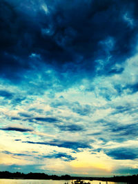 Low angle view of dramatic sky during sunset