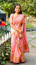 Portrait of a smiling young woman standing outdoors